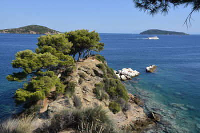 Scenic view of sea against clear blue sky