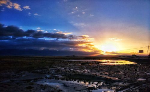 View of calm sea at sunset