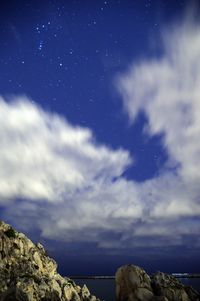 Low angle view of cloudy sky over sea