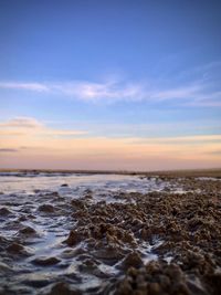 Scenic view of sea against sky during sunset