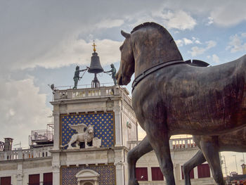 Statue of a horse in venice against sky