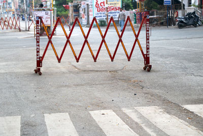 Text on footpath by city street