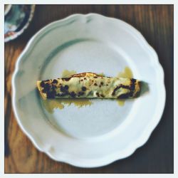 Close-up of bread in plate on table