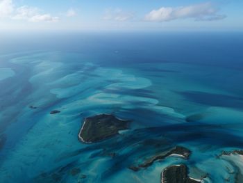 Aerial view of sea against sky