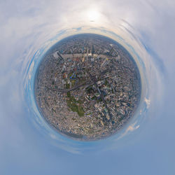 High angle view of sea against buildings in city