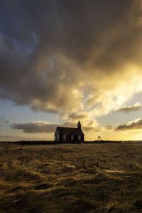 View of the budakirkja, the famous black church in budir in the snaefelsness peninsula, iceland