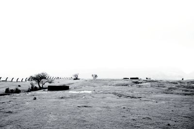 Scenic view of beach against clear sky