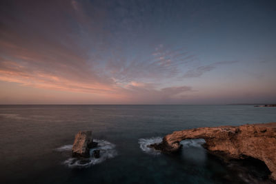 Long exposure of monachus monachus arch/love arch at sunrise near ayia napa.