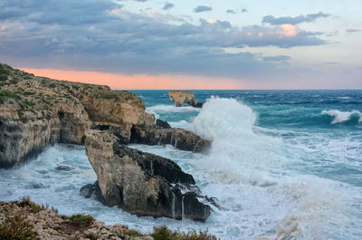 Scenic view of sea against sky during sunset