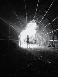 Woman in tunnel