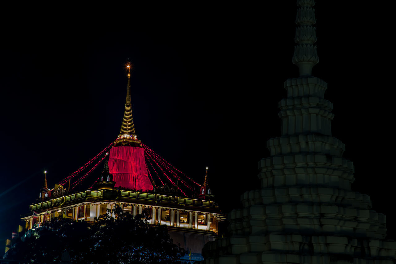 ILLUMINATED BUILDING AT NIGHT