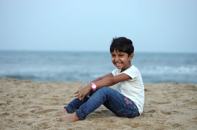 Portrait of happy boy on beach