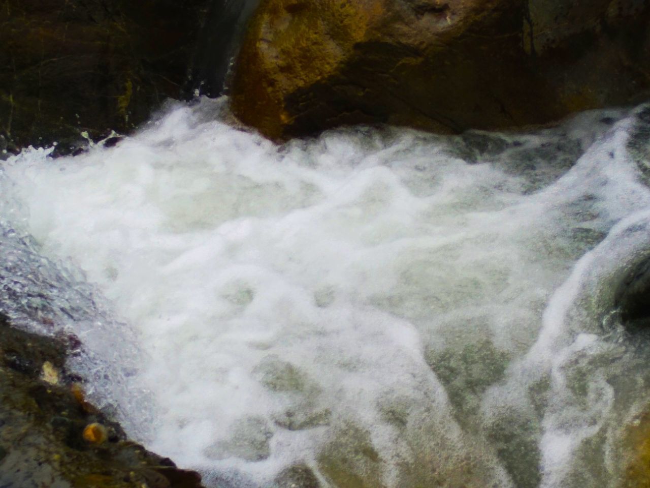 motion, scenics - nature, water, beauty in nature, sea, rock, waterfall, long exposure, surfing, rock - object, sport, flowing water, solid, aquatic sport, blurred motion, nature, day, power in nature, flowing, outdoors