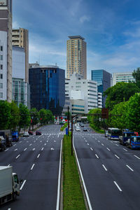 City street and buildings against sky aoyama street 