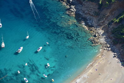 High angle view of sailboats in sea