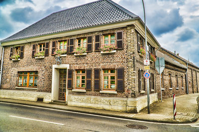 Buildings in city against sky