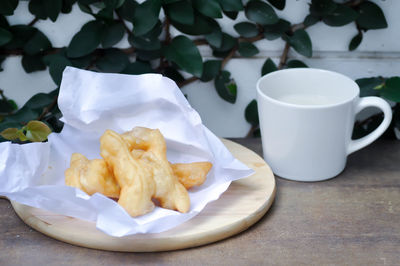 Close-up of coffee cup on table