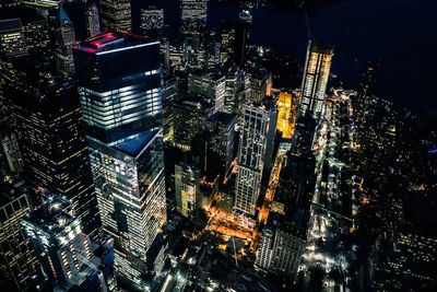 Aerial view of illuminated cityscape at night