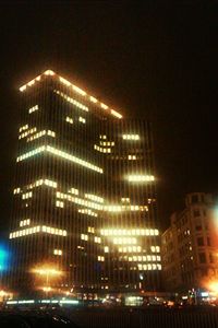 Low angle view of modern building at night