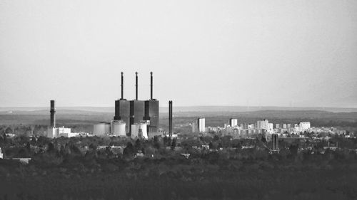 View of factory against clear sky