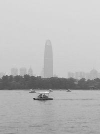 Boat in sea against sky