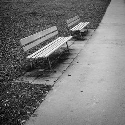 High angle view of empty bench in park