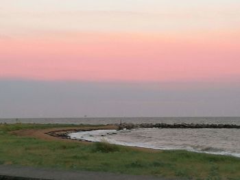 Scenic view of sea at sunset