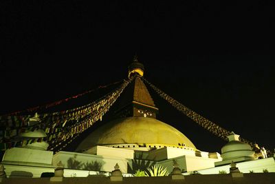 Low angle view of illuminated built structure