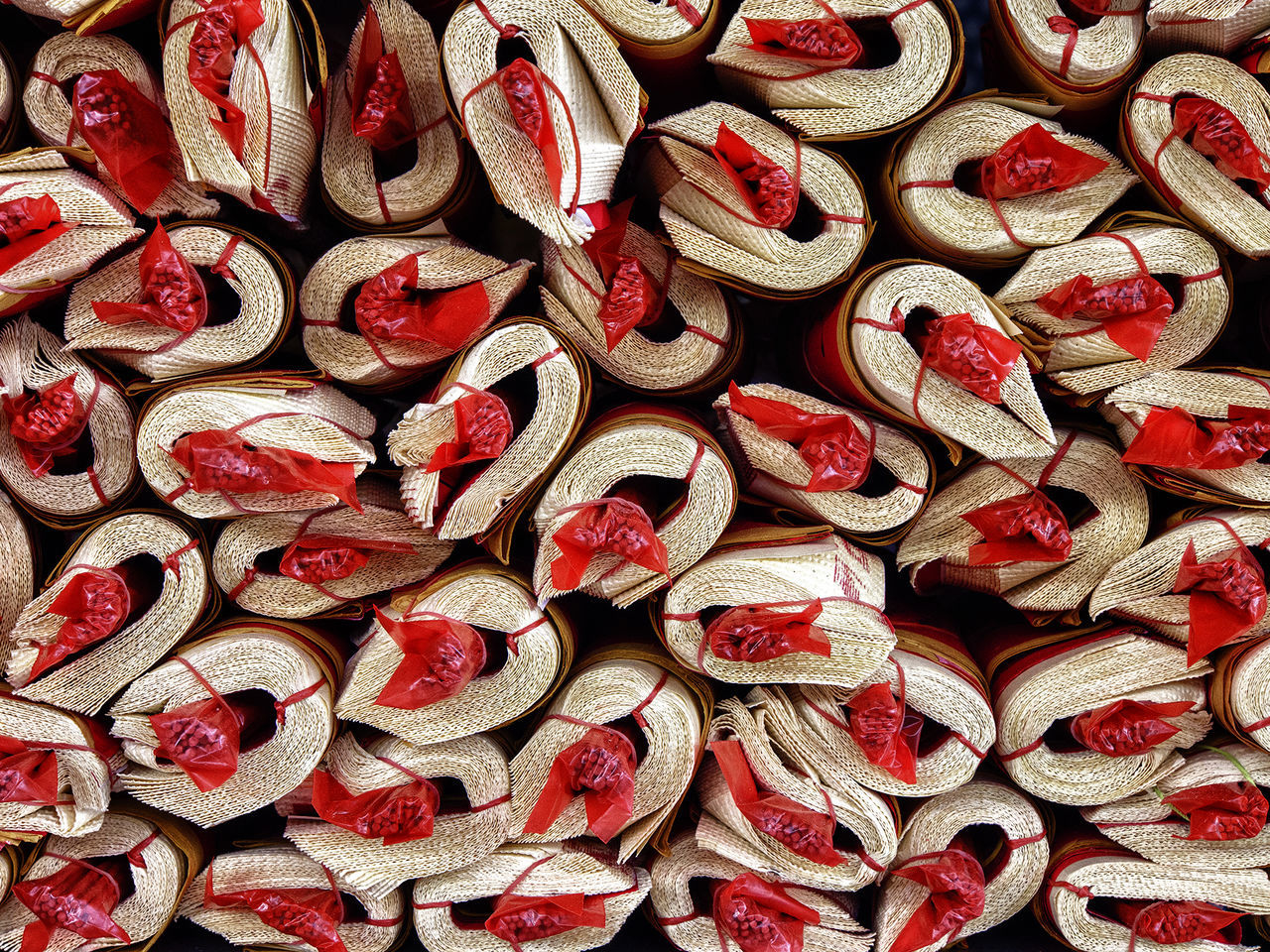 Incense paper wrapped with joss sticks for worshippers