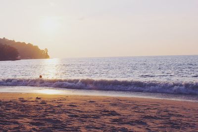 Scenic view of sea at sunset