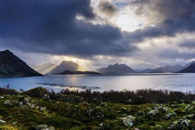 Scenic view of mountains against cloudy sky