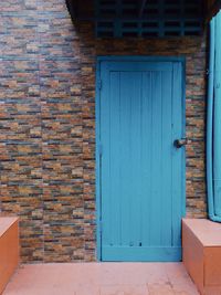 Closed blue door of building