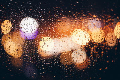 Full frame of water drops on glass