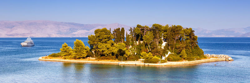 Scenic view of bay against sky