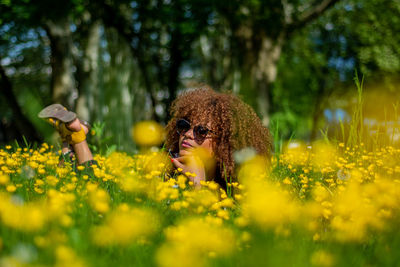 View of yellow flowering plants on field