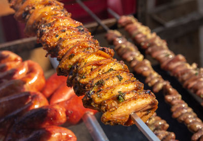 Close-up of meat on barbecue grill