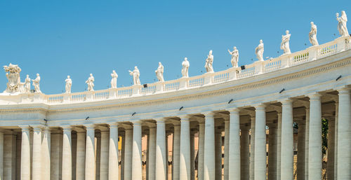 Low angle view of historical building against blue sky