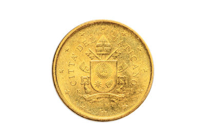 Close-up of coins on white background