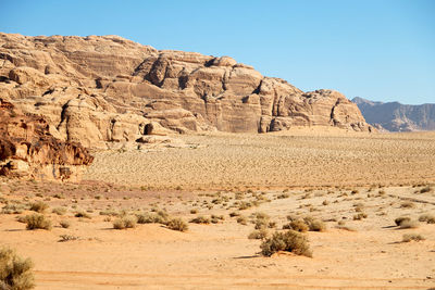 Scenic view of rocky mountains against clear sky