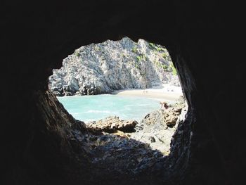 Scenic view of rock formation in sea