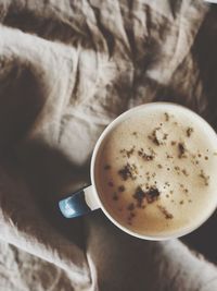 High angle view of coffee cup on table