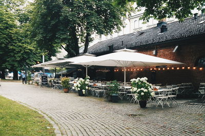 Chairs and tables at sidewalk cafe