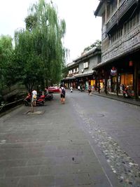 People on street in city