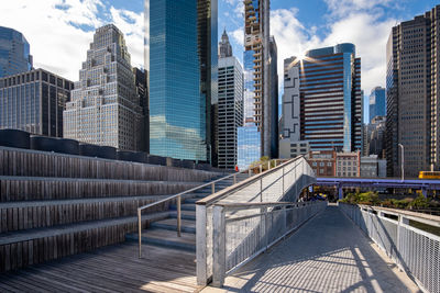 Modern buildings in city against sky