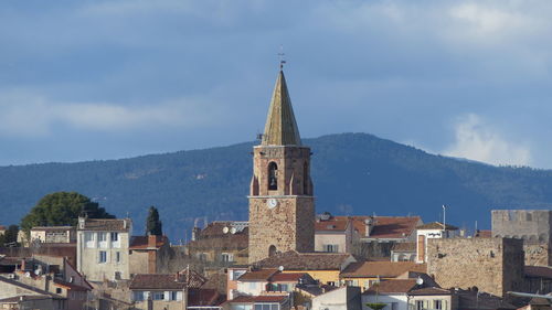 High angle view of buildings in city against sky