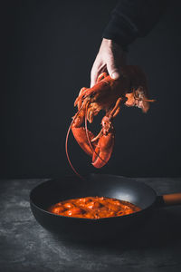 Midsection of man preparing food