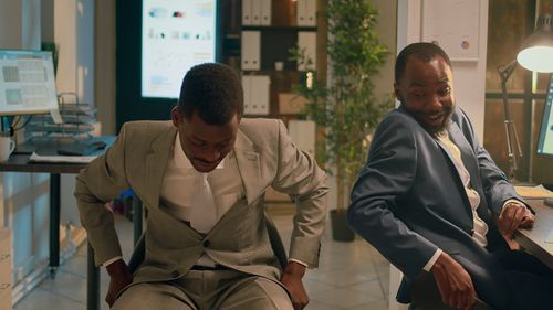 Side view of man using mobile phone