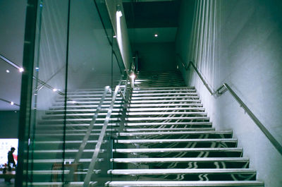 Low angle view of illuminated staircase in building