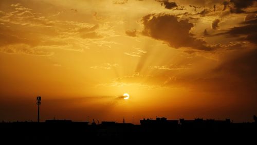 Scenic view of dramatic sky during sunset