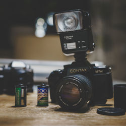 Close-up of camera on table